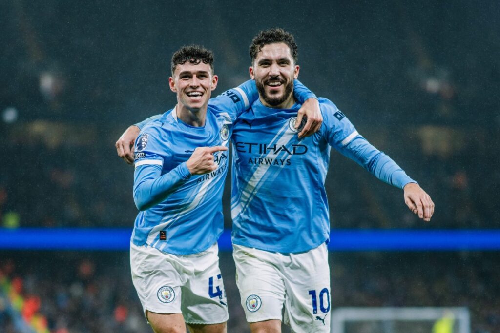 Manchester City Secures Victory, Trails Arsenal by Only Two Points