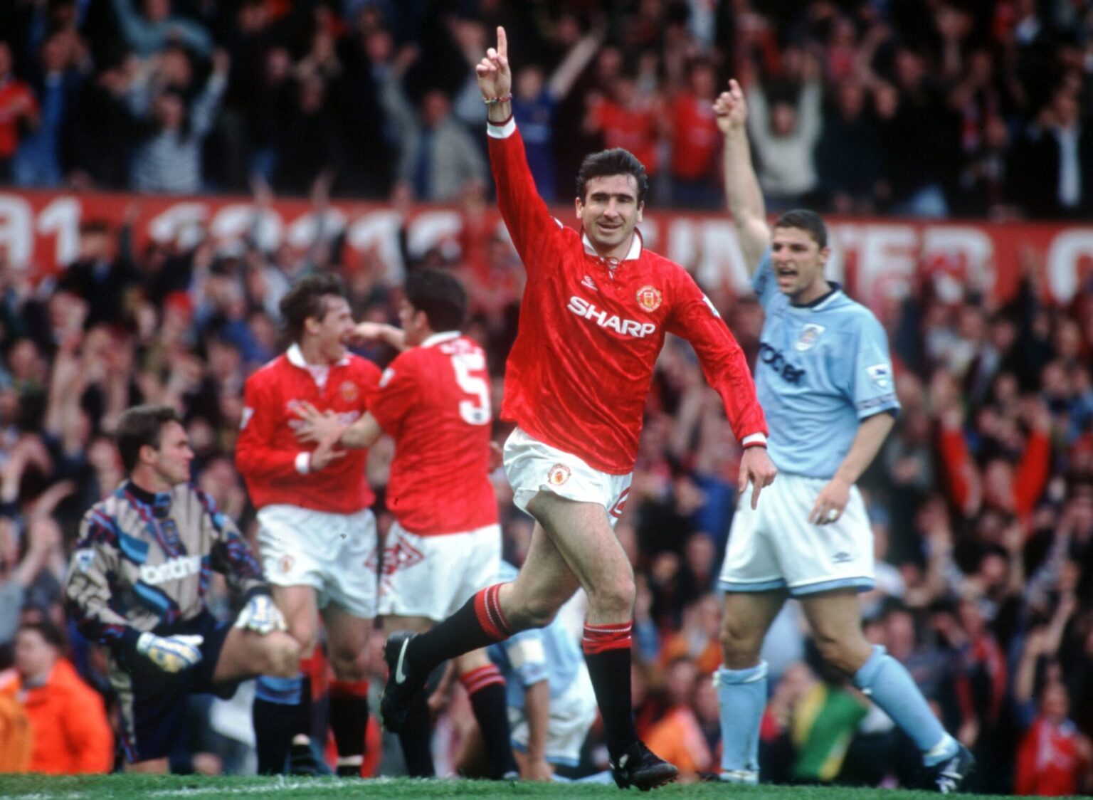 Manchester United Signs Cantona from Leeds