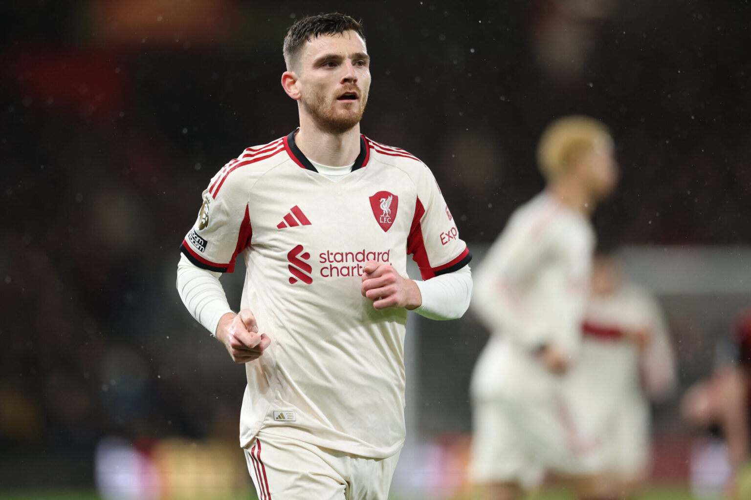 Van Dijk Encourages Robertson to Remain Amid Ongoing Tottenham Transfer Talks