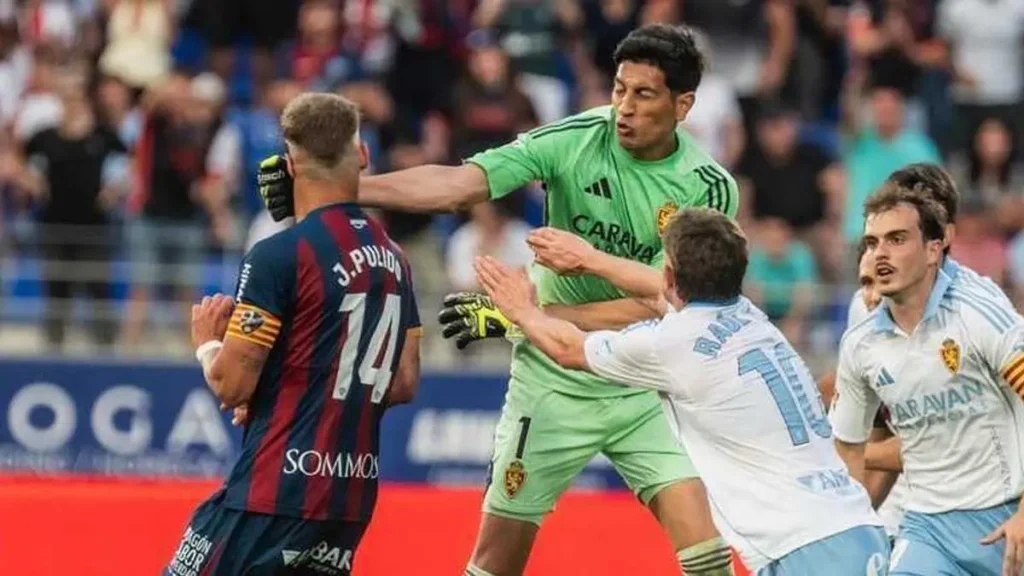 Spain goalkeeper receives long suspension for punching opponent in the face.