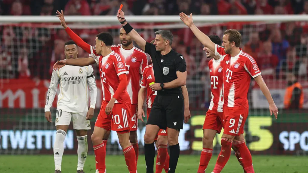 Tempers flare as Real Madrid players confront referee after match, leading to red card