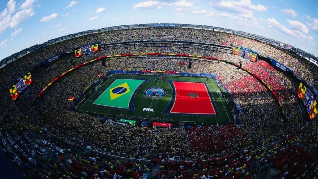 Star coach brings his sons to watch Brazil-Morocco match as a special guest.